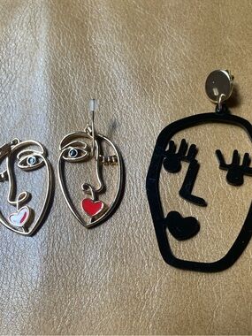 Anthropologie Picasso face earrings and H&M single Picasso face earring